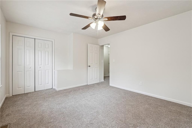 4282 Worth St NW, Acworth, GA 30101 - unfurnished bedroom with a ceiling fan, baseboards, carpet, and a closet