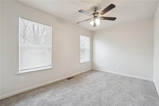 4282 Worth St NW, Acworth, GA 30101 - carpeted empty room featuring visible vents, baseboards, and ceiling fan