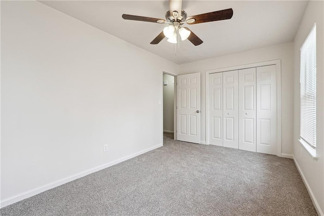 4282 Worth St NW, Acworth, GA 30101 - unfurnished bedroom with ceiling fan, baseboards, carpet flooring, and a closet