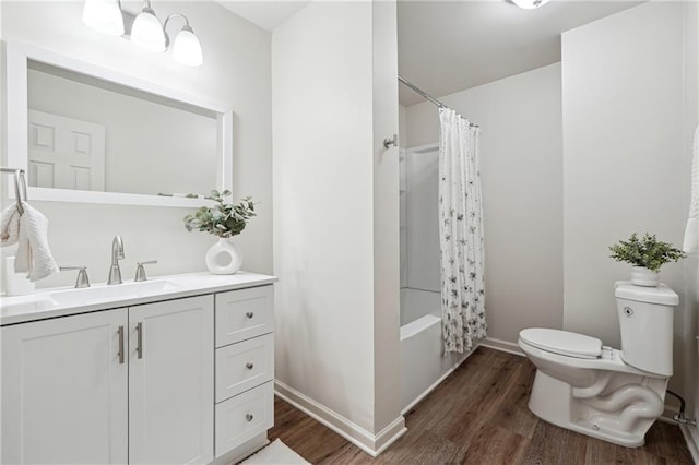 4282 Worth St NW, Acworth, GA 30101 - bathroom featuring shower / bath combination with curtain, wood finished floors, toilet, vanity, and baseboards