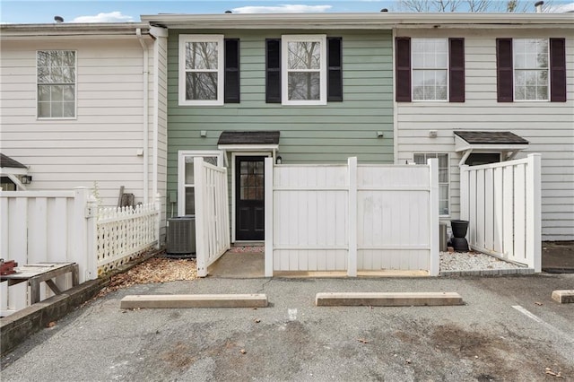 4282 Worth St NW, Acworth, GA 30101 - view of property with central air condition unit, uncovered parking, and fence