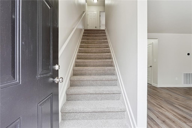 4282 Worth St NW, Acworth, GA 30101 - stairs featuring wood finished floors, visible vents, and baseboards
