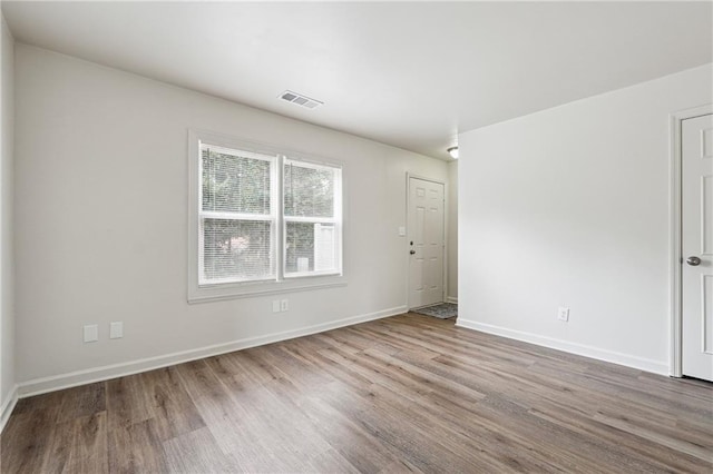 4282 Worth St NW, Acworth, GA 30101 - unfurnished room with wood finished floors, visible vents, and baseboards