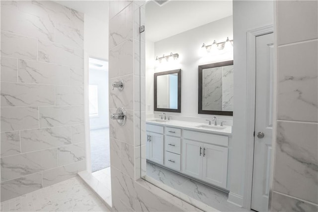 bathroom featuring vanity and walk in shower