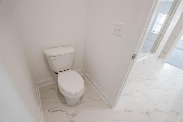 bathroom featuring toilet