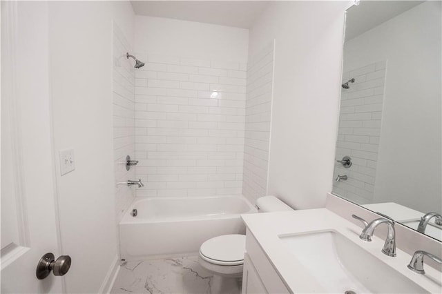 full bathroom featuring vanity, toilet, and tiled shower / bath combo