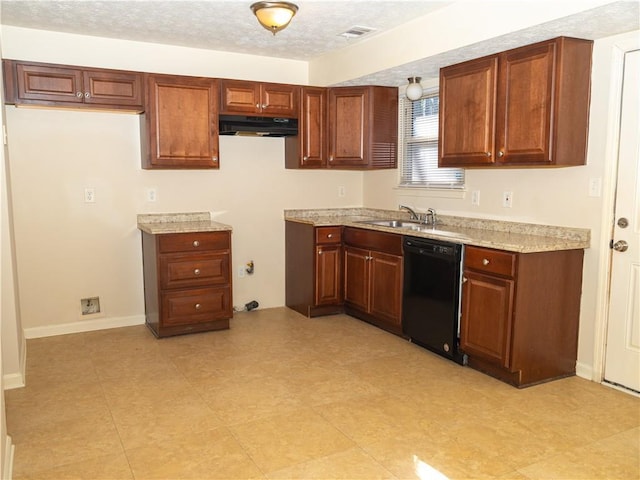 kitchen featuring light stone countertops, sink, a textured ceiling, and black dishwasher