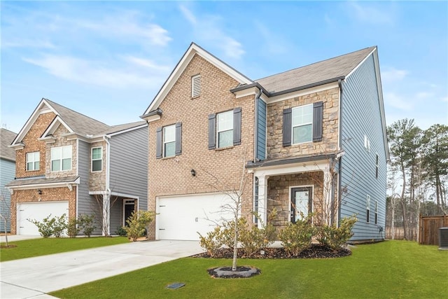 view of front of house featuring a front yard and a garage