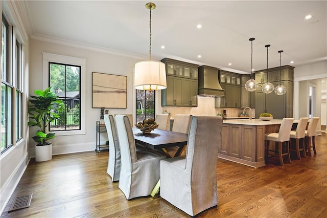 11 Brownson Ct, Acworth, GA 30101 - dining area with baseboards, recessed lighting, crown molding, and dark wood finished floors