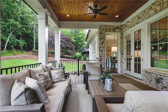 11 Brownson Ct, Acworth, GA 30101 - wooden deck featuring french doors, an outdoor hangout area, a ceiling fan, and a lawn