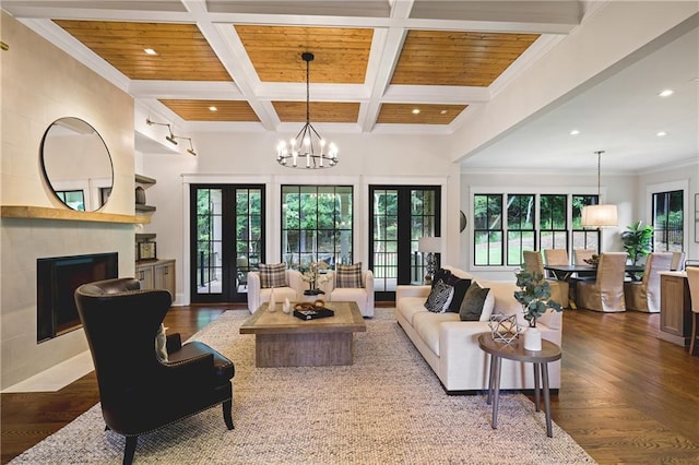 11 Brownson Ct, Acworth, GA 30101 - living area with a fireplace, coffered ceiling, a chandelier, wood finished floors, and recessed lighting