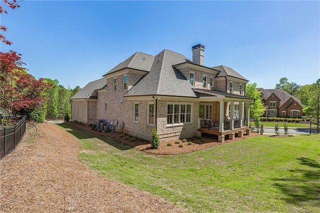 11 Brownson Ct, Acworth, GA 30101 - back of property with a chimney, a shingled roof, brick siding, and central AC unit