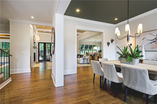 11 Brownson Ct, Acworth, GA 30101 - dining room featuring crown molding, plenty of natural light, dark wood finished floors, a chandelier, and recessed lighting