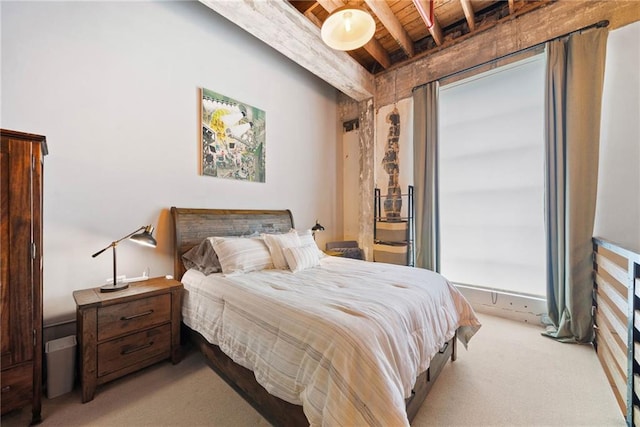 650 Glen Iris Dr NE Unit 26, Atlanta, GA 30308 - bedroom featuring a wood ceiling with exposed beams and light carpet