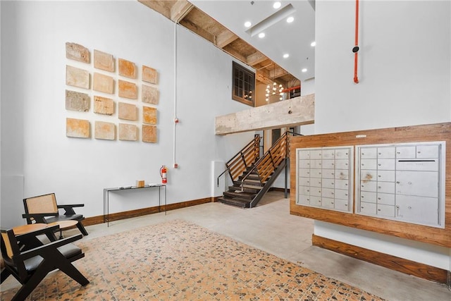 650 Glen Iris Dr NE Unit 26, Atlanta, GA 30308 - sitting room with finished concrete flooring, mail area, and recessed lighting