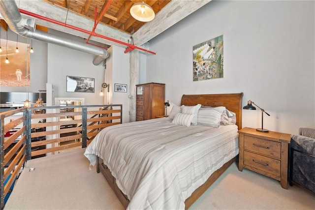 650 Glen Iris Dr NE Unit 26, Atlanta, GA 30308 - carpeted bedroom with a towering ceiling