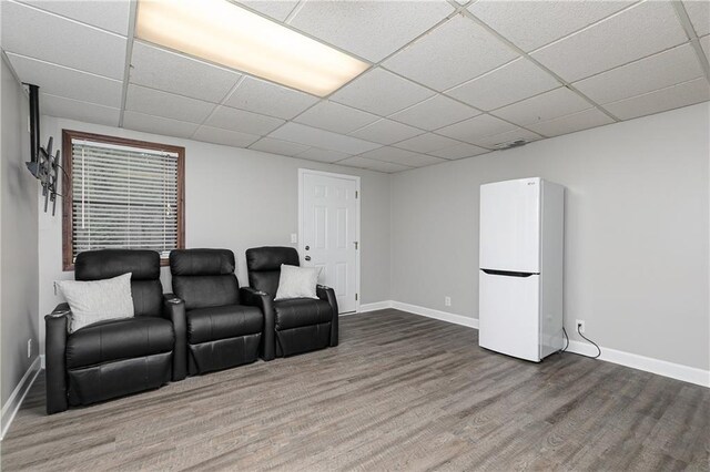 4065 Maxanne Dr NW, Kennesaw, GA 30144 - cinema room featuring baseboards, visible vents, wood finished floors, and a paneled ceiling