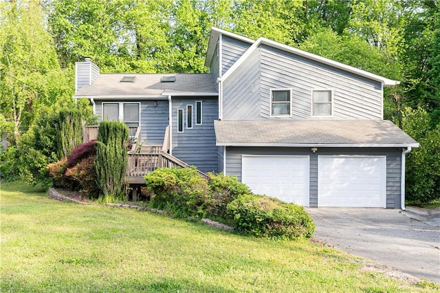 4065 Maxanne Dr NW, Kennesaw, GA 30144 - tri-level home with a garage, a front lawn, a chimney, and aphalt driveway