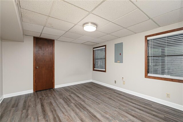 4065 Maxanne Dr NW, Kennesaw, GA 30144 - finished below grade area featuring electric panel, a paneled ceiling, wood finished floors, and baseboards
