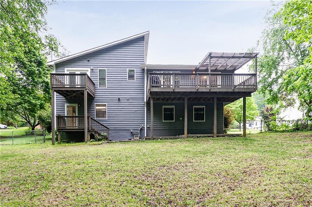 4065 Maxanne Dr NW, Kennesaw, GA 30144 - rear view of property with a wooden deck, fence, and a yard