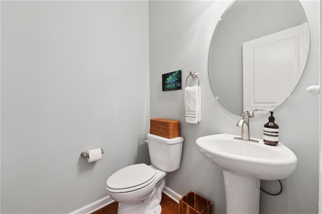 506 Spring View Dr, Woodstock, GA 30188 - bathroom featuring baseboards and wood finished floors