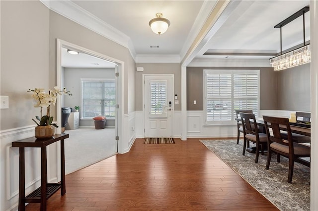 506 Spring View Dr, Woodstock, GA 30188 - entrance foyer with crown molding, dark wood-style floors, and wainscoting