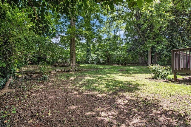 1829 Goddard St SE, Atlanta, GA 30315 - view of grassy yard with a wooden deck