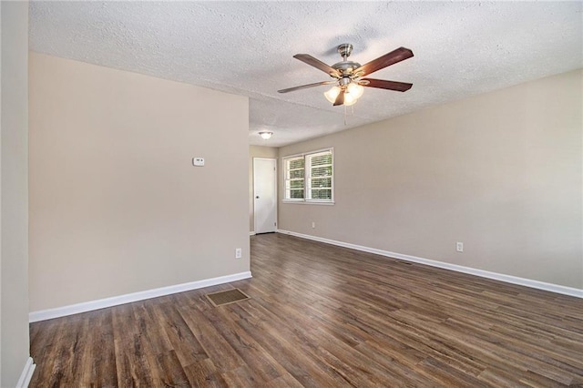 1829 Goddard St SE, Atlanta, GA 30315 - spare room featuring a ceiling fan, dark wood-type flooring, and a textured ceiling