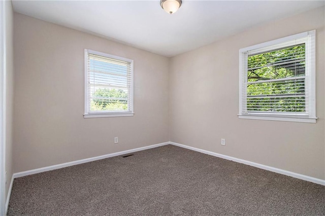 1829 Goddard St SE, Atlanta, GA 30315 - spare room with plenty of natural light and carpet floors
