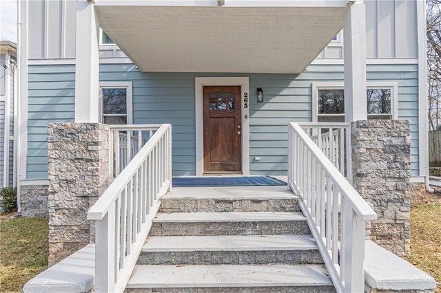 view of front of home with covered porch and a balcony