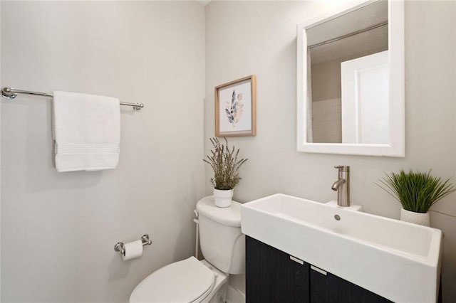 bathroom featuring toilet and a sink