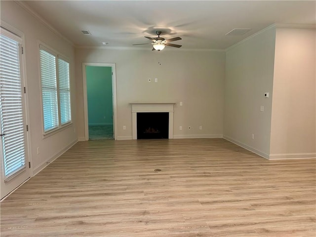 619 Linger Longer Dr, Ellijay, GA 30540 - unfurnished living room featuring a ceiling fan, light wood finished floors, a fireplace, and crown molding