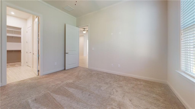 619 Linger Longer Dr, Ellijay, GA 30540 - unfurnished bedroom featuring carpet flooring, crown molding, and a spacious closet