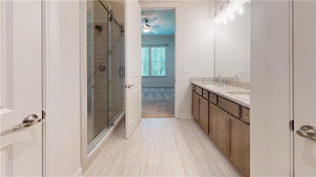 619 Linger Longer Dr, Ellijay, GA 30540 - bathroom featuring double vanity, a shower stall, and a ceiling fan