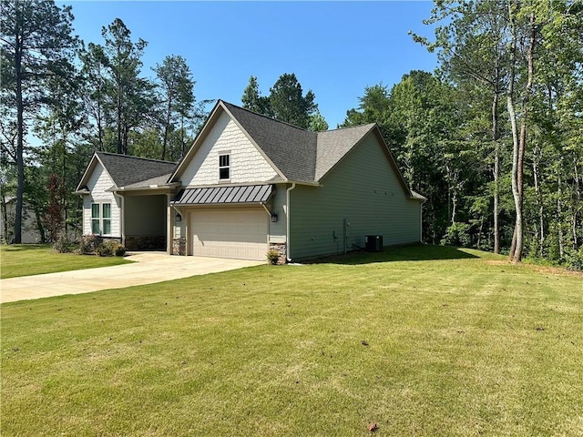 619 Linger Longer Dr, Ellijay, GA 30540 - view of home's exterior with stone siding, concrete driveway, roof with shingles, a yard, and a standing seam roof