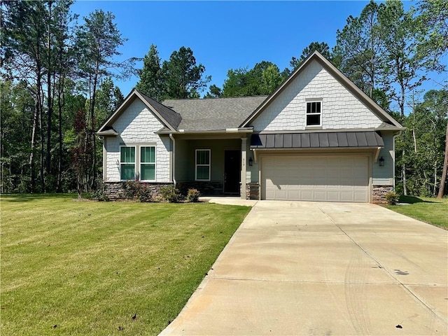 619 Linger Longer Dr, Ellijay, GA 30540 - view of front facade with concrete driveway, a front yard, stone siding, and a garage