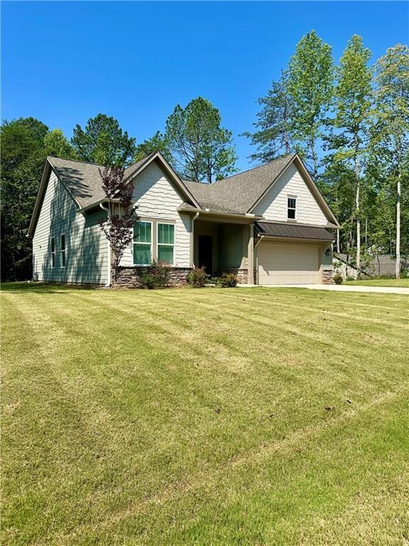 619 Linger Longer Dr, Ellijay, GA 30540 - single story home with a front yard, a garage, and stone siding