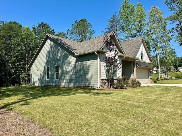 619 Linger Longer Dr, Ellijay, GA 30540 - view of home's exterior featuring an attached garage, a yard, driveway, and roof with shingles