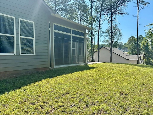 619 Linger Longer Dr, Ellijay, GA 30540 - view of grassy yard with a sunroom