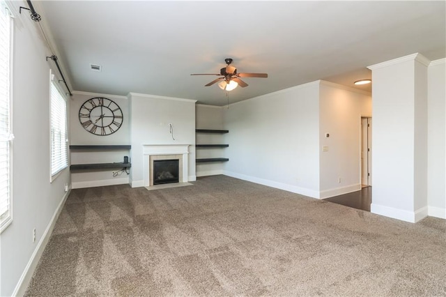 626 Discovery Ct, Acworth, GA 30102 - unfurnished living room with crown molding, a fireplace with flush hearth, carpet, and ceiling fan