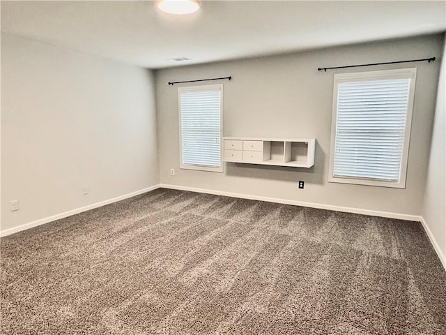 626 Discovery Ct, Acworth, GA 30102 - unfurnished room featuring baseboards and dark carpet