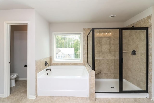 626 Discovery Ct, Acworth, GA 30102 - bathroom with tile patterned flooring, a shower stall, toilet, and a garden tub