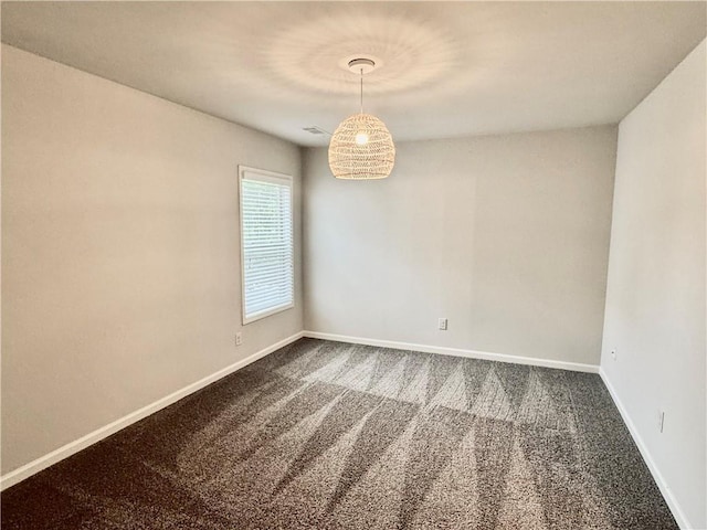 626 Discovery Ct, Acworth, GA 30102 - spare room featuring baseboards and dark carpet