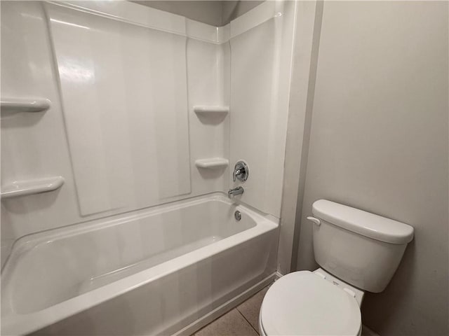 626 Discovery Ct, Acworth, GA 30102 - bathroom featuring tile patterned floors, washtub / shower combination, and toilet