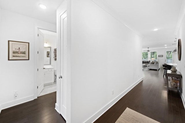 209 Floral Valley Dr, Woodstock, GA 30188 - hallway with dark wood finished floors, baseboards, and recessed lighting