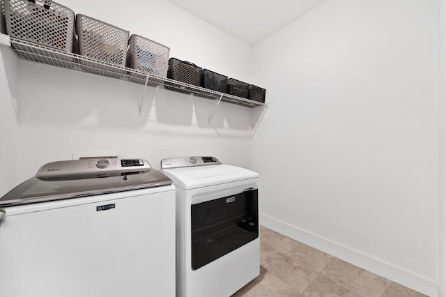 209 Floral Valley Dr, Woodstock, GA 30188 - laundry area with independent washer and dryer and baseboards
