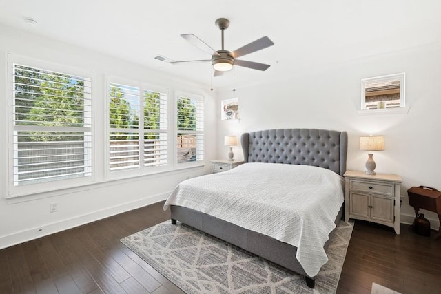 209 Floral Valley Dr, Woodstock, GA 30188 - bedroom featuring baseboards, multiple windows, dark wood-style floors, and a ceiling fan