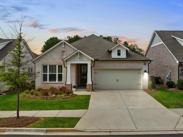 209 Floral Valley Dr, Woodstock, GA 30188 - view of front of house with an attached garage, brick siding, concrete driveway, and a front yard