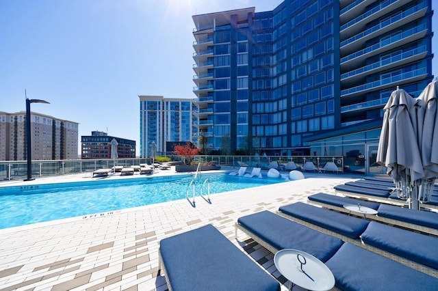 view of pool featuring a patio area