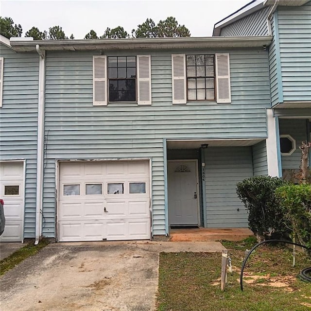 view of property featuring a garage